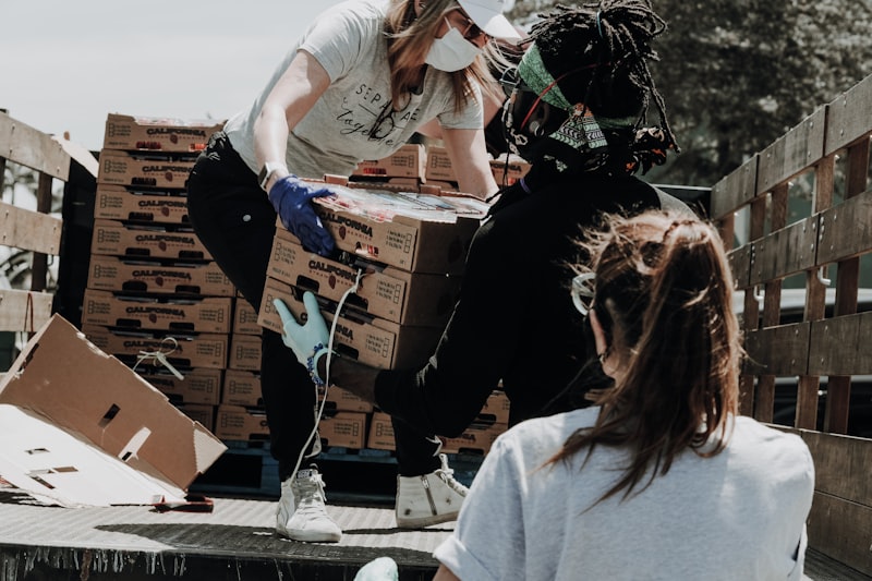 Volunteers sorting food at a pantry location